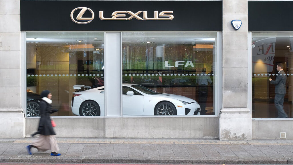 lexus-car-through-window-car-dealership